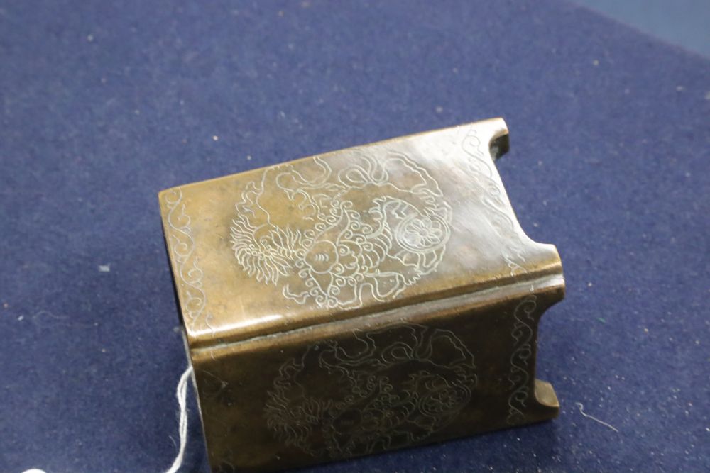 A Chinese bronze and silver inlaid square brush pot,